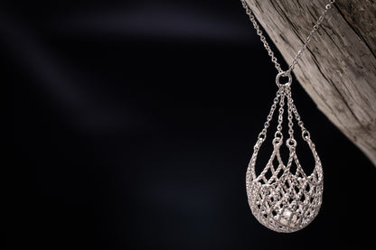 Pearl in a net necklace
