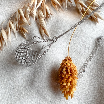 Pearl in a net necklace